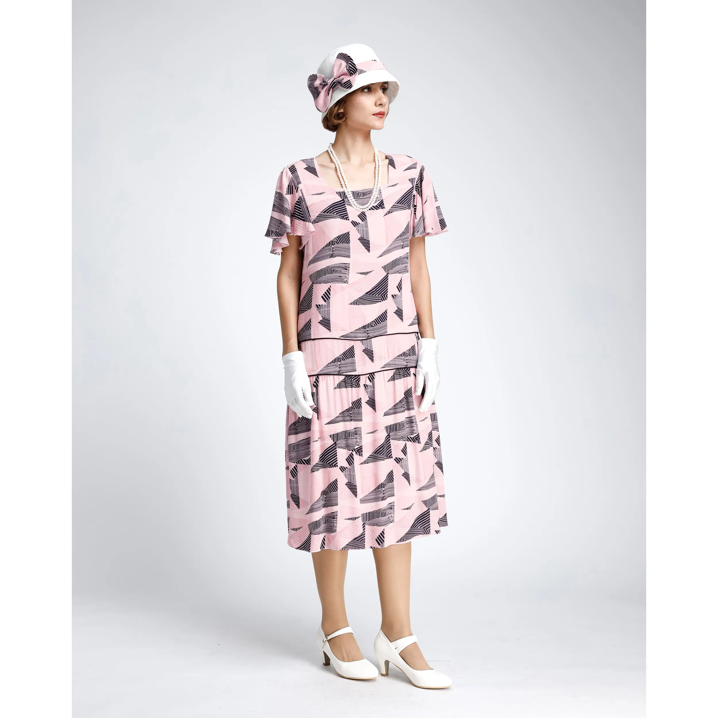 1920s off-white cloche hat with pink and black ribbon
