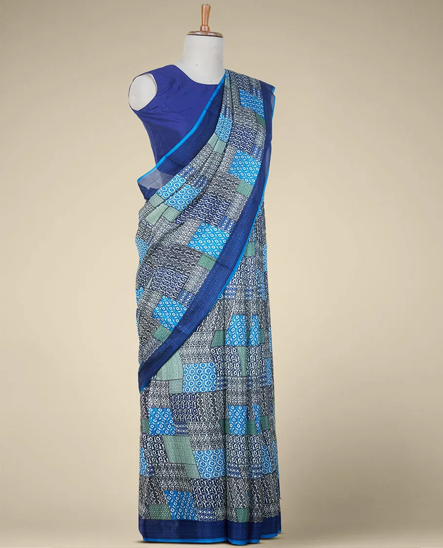 Multi-color geometric patterns printed semi banaras crepe saree, contrast blue border printed with unique motifs